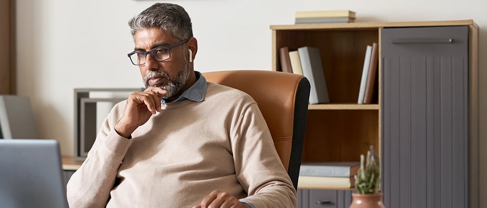 Man looking at a computer